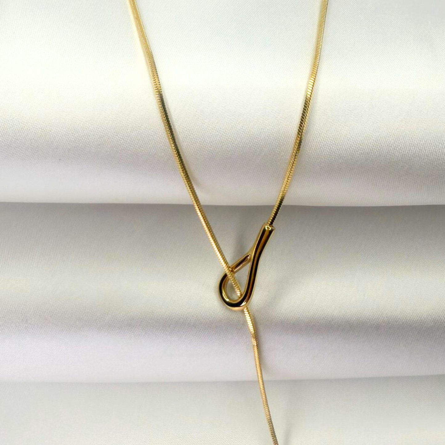 The Liquid Knot Lariat