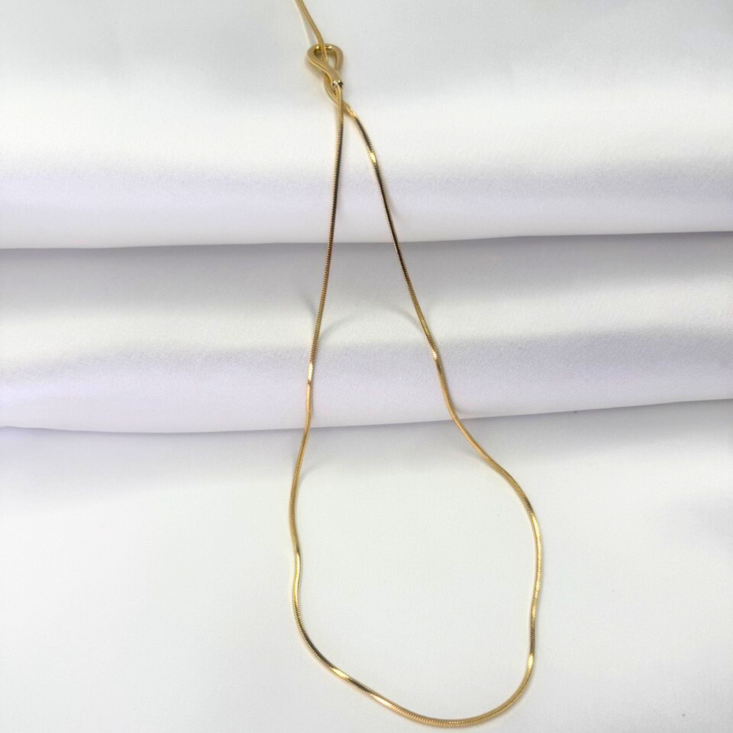 The Liquid Knot Lariat