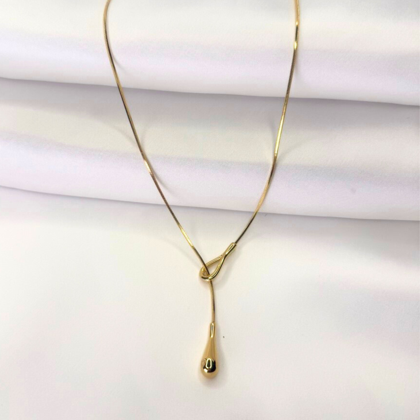 The Liquid Knot Lariat